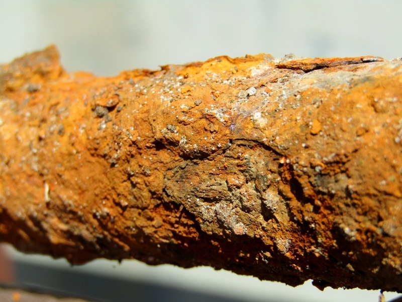 corroded metal pipe revealed during drain camera inspection for damage assessment